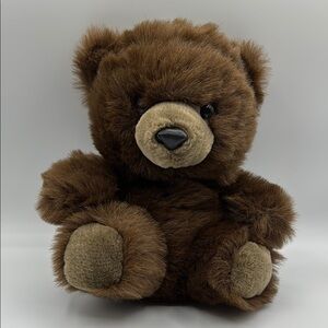 Vintage 1992 Ace Novelty Co stuffed brown bear with hidden compartment.